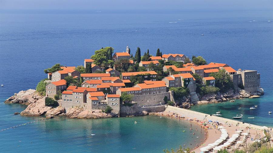 Sveti Stefan island connected to the mainland by a sand causeway on the Budva riviera